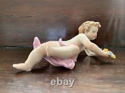 Extremely Rare Giuseppe Cappe' Capodimonte Pair of Cherubs with Garlands