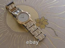 État de stock ancien extrêmement rare, bracelet intégré Universal Genève