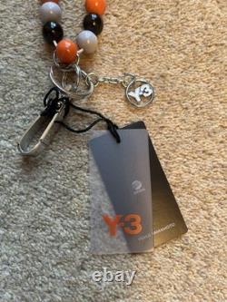 Lanière Y3 Yohji Yamamoto extrêmement rare. Très collectionnable. Neuf dans sa boîte.