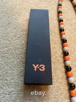 Lanière Y3 Yohji Yamamoto extrêmement rare. Très collectionnable. Neuf dans sa boîte.