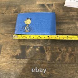 Nouveau portefeuille bifold fin bleu Coach x Peanuts Pig-Pen Snoopy extrêmement rare