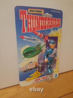 Une figurine John Tracy Thunderbirds vintage extrêmement rare, sur carte neuve, 1992, jamais déballée.
