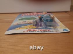 Une figurine John Tracy Thunderbirds vintage extrêmement rare, sur carte neuve, 1992, jamais déballée.